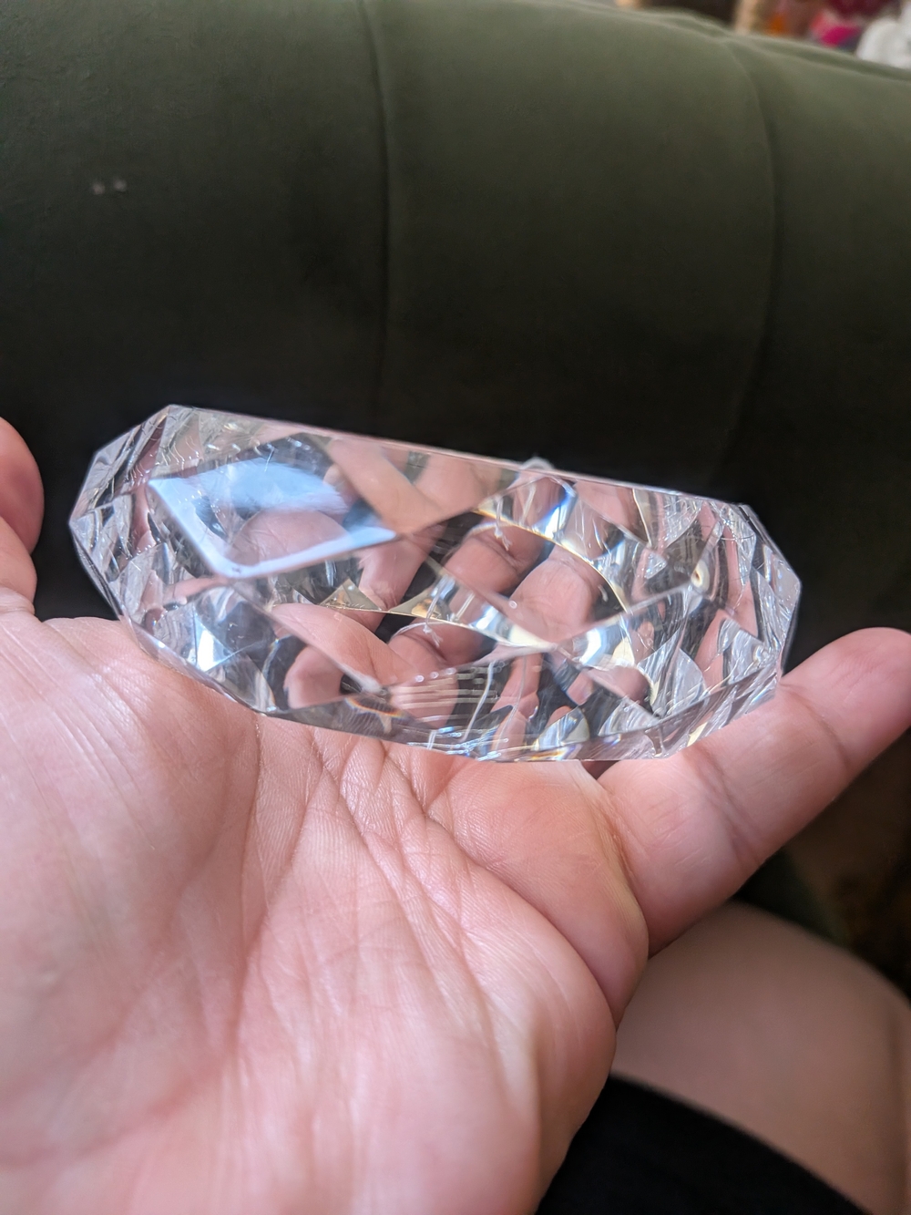 clear faceted Lucite bangle bracelet featuring a chunky design.